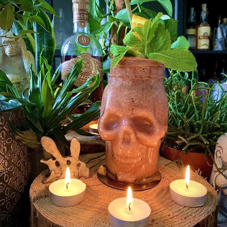 spooky papaya colada rum cocktail